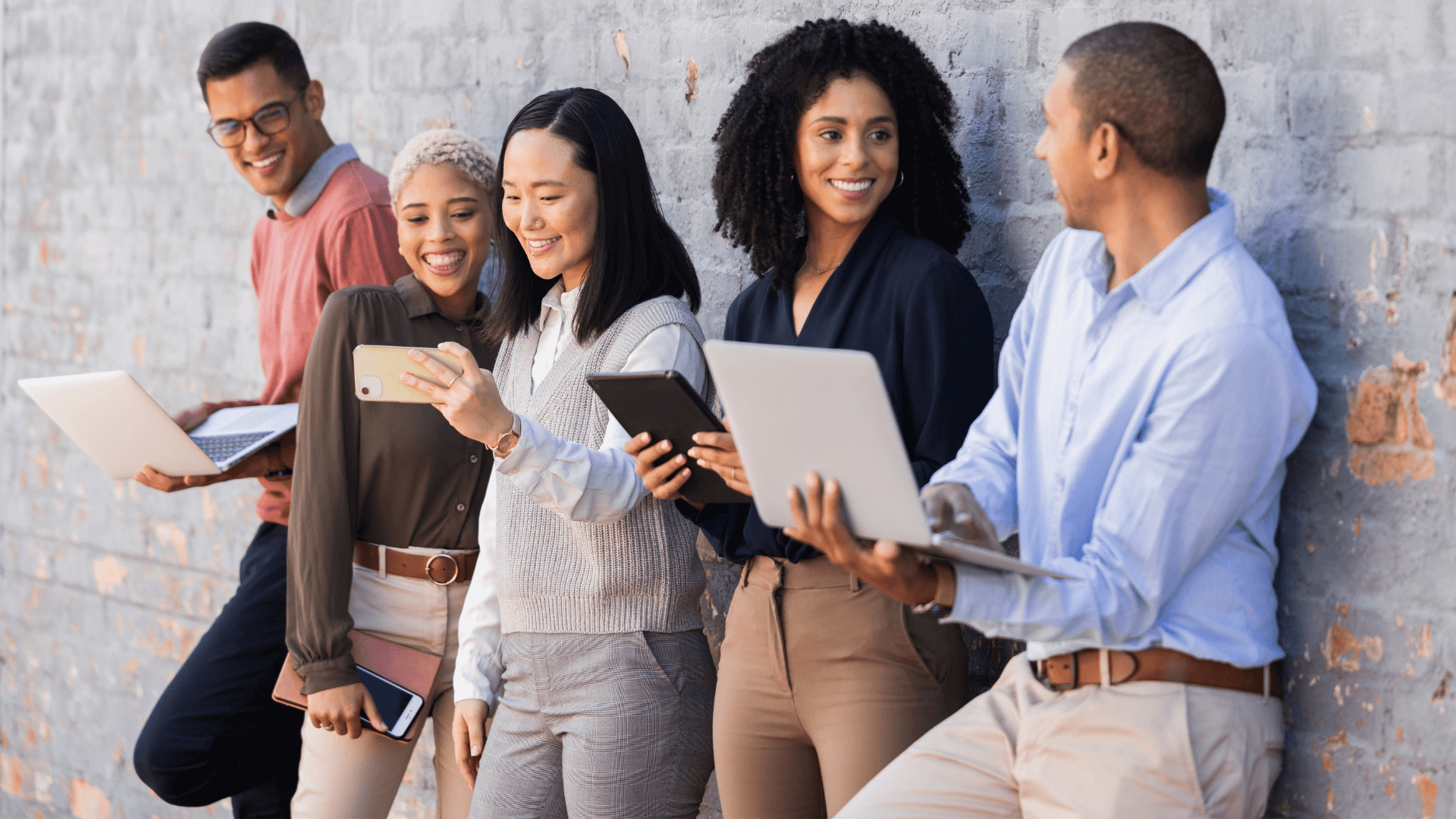 group of people with the laptops