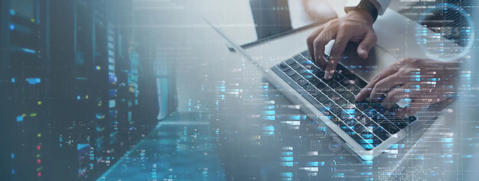 hands typing on the laptop's keyboard